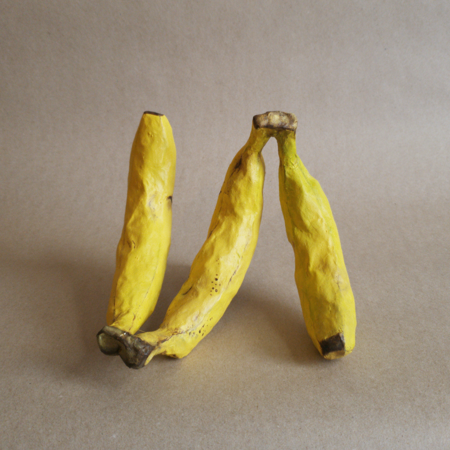 Tripplet Banana | 12x10x6in, papier mache sculpture with acrylic paint, 2025.