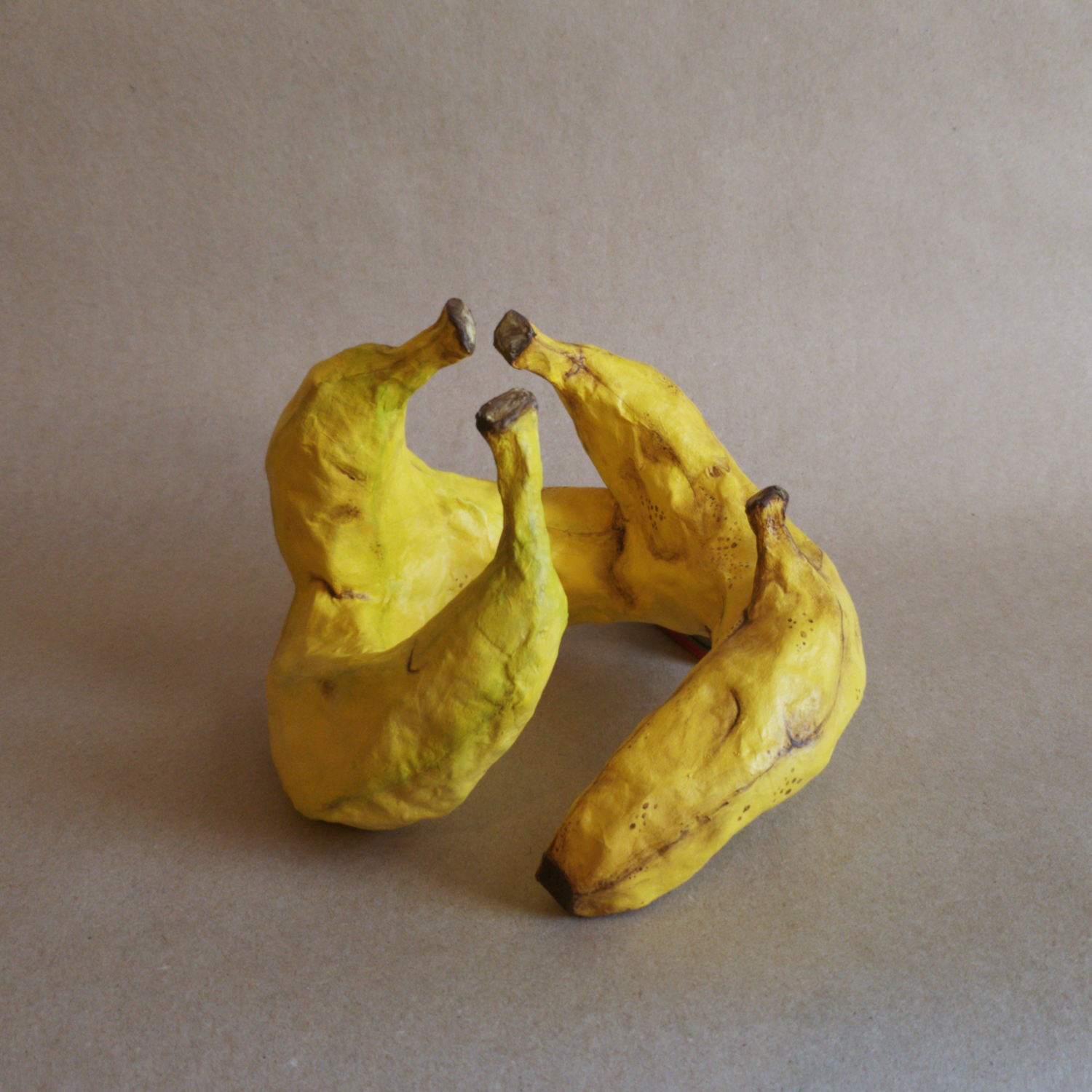 Crown Banana | 12x12x10in, papier mache sculpture with acrylic paint, 2026.