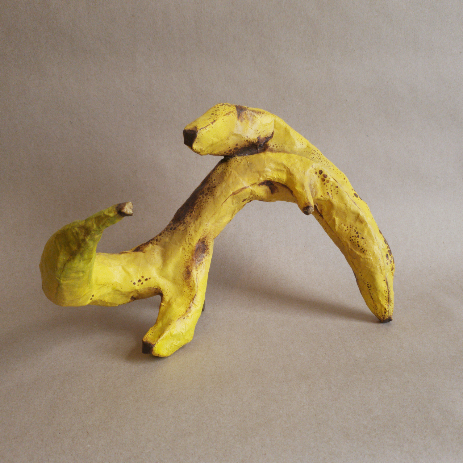 Wavy Banana | 18x12x10in, papier mache sculpture with acrylic paint, 2025.